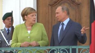 Vladimir Putin și Angela Merkel în întâlnirea de la Berlin