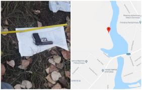 Pistolul furat de la femeia jandarm a fost găsit pe câmp, lângă un bazin piscol din Ilfov