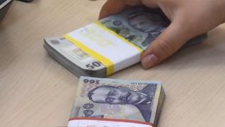 Bani româneşti număraţi la bancă