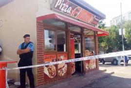 Atac la o pizzerie din Buzău, cu macete şi topoare