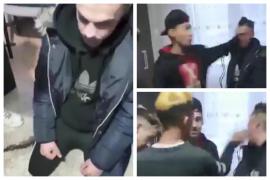 Tânăr bătut, pus în genunchi şi umilit de trei băieţi