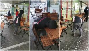 Video cu un adolescent care cade pe masă, afară în frig, paralizat de drogul "zombie", la Timișoara