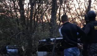 BMW urmărit de mascaţi