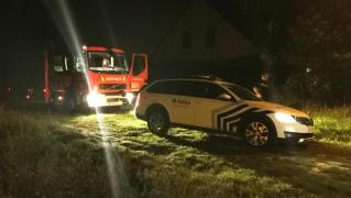 Mașină a poliției belgiene la locul unde au fost executați cei doi frați români