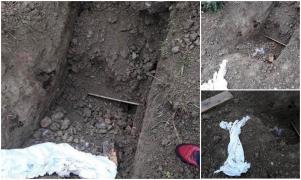 Trupul unui bărbat găsit dezgropat într-un cimitir din Mureş, urme uriaşe de zgârieturi descoperite pe sicriu, posibil de la un urs