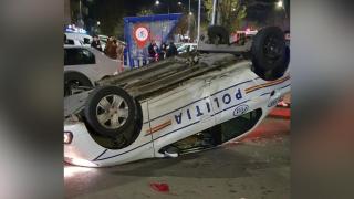 Mașina de poliție răsturnată în Apărătorii Patriei, București