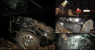 BMW fără cauciucuri de iarnă, direct în pădure după ce drumul a făcut la stânga