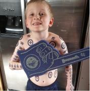 La 7 ani, Dyson este mare fan al echipei de hochei pe gheaţă Winnipeg Jets