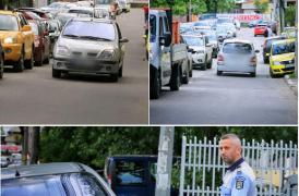 Şofer întors la coadă la semafor