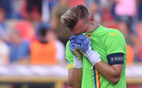 Ionuț Radu cu ochii în lacrimi pe teren