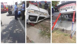 O poliţistă a fost rănită grav, fiind prinsă între fiarele maşinii