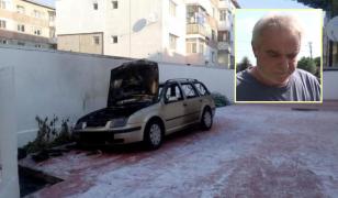 Preotul care a incendiat maşina soţiei, supărat că femeia plecase la mare, nu mai are voie să slujească (Video)