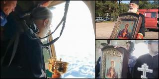 Oraș din Rusia, stropit cu aghiasmă din avion