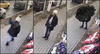Femeia filmată în timp ce fură două coroane funerare de la o florărie din Bucureşti
