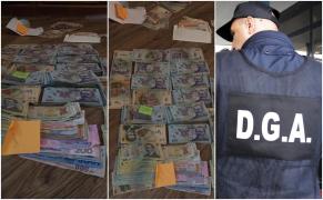 Un ofiţer Anticorupție îi asigura "spatele" şefului de la Permise Suceava, care făcea şi 20.000 de euro pe zi din şpagă, susţin procurorii