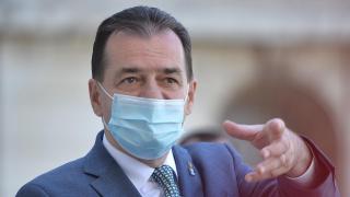 Ludovic Orban poartă mască la declaraţii de presă