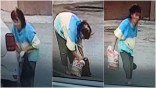 Femeia de 70 de ani a fost filmată cu mai multe pung în mâini și deplasându-se greoi, aplecat.