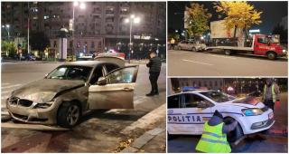 Un BMW a spulberat mașina Poliției, în centrul Bucureștiului. Autospeciala a ajuns într-un panou publicitar