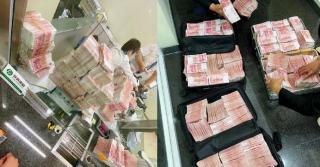 Răzbunarea unui milionar chinez după ce i s-a refuzat accesul în bancă pentru că nu avea mască: şi-a scos banii şi i-a obligat pe angajaţi să-i numere manual