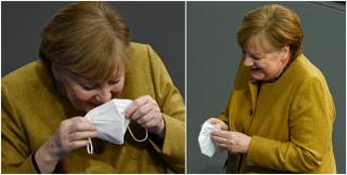 Cancelarul german izbucneşte în râs chiar înainte să îşi pună masca sanitară la loc