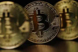 Bitcoin a atins nivelul record de 60.000 de dolari