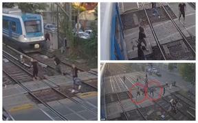 Răfuială între interlopi pe șinele de tren, în Argentina. Un tren evită la limită doi dintre bătăuși