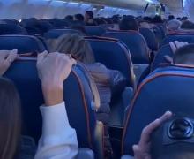 Video dramatic cu momentul în care pasagerii unui avion sunt avertizați să se pregătească de impact, în Rusia
