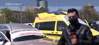 Maşini mortuare, în faţa Guvernului. Angajaţii de la pompe funebre sunt revoltaţi că trebuie să îmbrace morţii de COVID-19