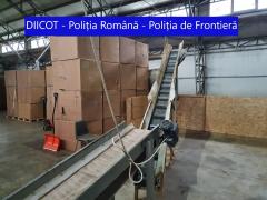 Fabrică clandestină de ţigări, descoperită în Dolj. DIICOT a publicat imagini cu linia de producție. VIDEO