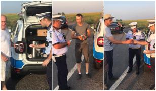 Șoferii în drum spre mare, opriți în trafic, pentru a fi serviți cu cafea de către polițiștii brăileni