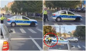 Val de reacţii pe internet, după ce doi poliţişti au fost filmaţi în timp ce împing o autospecială