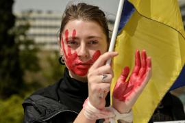 Violurile se ţin lanţ în oraşele ocupate de ruşi în Ucraina