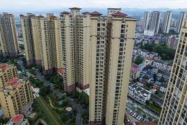 Dezvoltatorii imobiliari chinezi sunt atât de disperaţi, încât acceptă plata în grâu sau usturoi pentru apartamente