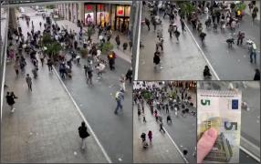 Au căzut bani din cer într-un centru comercial din Germania.  Oamenii s-au isterizat ca să strângă cât mai mulți