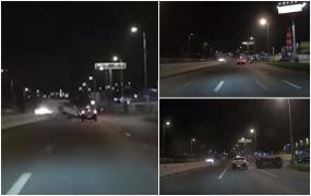 Momentul dramatic surprins de o cameră de bord când o şoferiţă din Cluj zboară peste perapet direct pe contrasens, după ce a pierdut controlul volanului