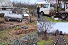 Cisternă cu lapte, spulberată de un tren pe o cale ferată, în Maramureş. Şoferul camionului a fost transportat la spital