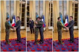 Macron vrea să îi retragă lui Putin Legiunea de Onoare după ce i-a oferit-o lui Zelenski. Cei doi s-au îmbrăţişat îndelung. VIDEO