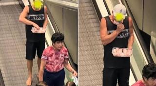 tânăr surprins în timp ce mănâncă carne crudă de găină, în Australia