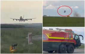 Momentul în care un avion Boeing 747 pierde trenul de aterizare pe aeroportul din Luxemburg. Roțile s-au rupt și au zburat zeci de metri în aer