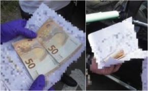 Şofer din Botoşani, prins în timp ce mituia poliţiştii. A pus 100 de euro în asigurarea maşinii, după ce a virat peste o linie continuă