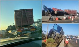 Dezastru la intrarea în Lețcani, după ce un șofer de TIR a adormit la volan. Camionul a spulberat sensul giratoriu, a lovit două mașini, apoi s-a răsturnat