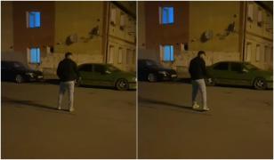 Tânăr teribilist, filmat în timp ce trage de trei ori cu pistolul în parcarea unui bloc din Reşiţa. Poliţiştii s-au autosesizat