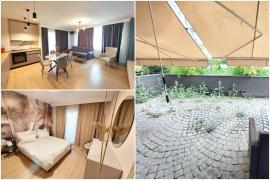 Cât costă chiria pentru un apartament de 54 mp în Cluj. Pe terasă cresc buruieni, dar locuinţa este prezentată ca "spectaculoasă"
