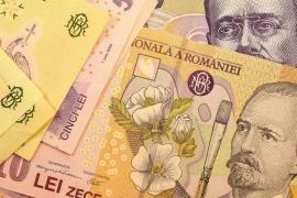 Leul românesc câştigă teren important în raport cu dolarul american