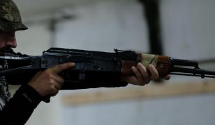 Percheziţii masive în Ucraina, într-o anchetă privind traficul de arme şi muniţii