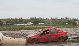 Despăgubirea uriaşă primită de un român după ce maşina i-a fost avariată în inundaţii