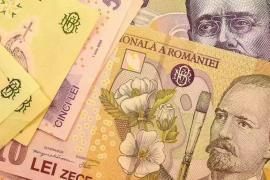 Leul românesc câştigă aproape 2 bani în raport cu dolarul american