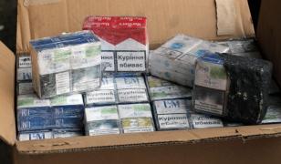 Trei ucraineni arestați după ce au fost prinși cu 25.000 de pachete de țigări într-o parcare din București