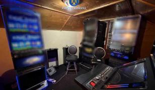 Un mehedinţean şi-a făcut sală de păcănele acasă. Mascaţii l-au săltat cu tot cu aparate