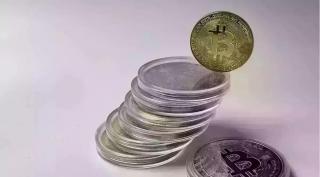 Valoarea monedei virtuale bitcoin este în scădere, faţă de ziua precedentă